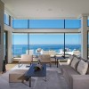 Breathtaking Contemporary Beach House With Perfect Architecture: Living Room Decorations With Modern Gray Sofa And 3 Pillows With Remarkable Floor Lamp And Beach Views With Awesome Fireplace As Well As Flat Screen TV