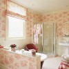 Enchanting Bathroom Design High Quality and Value to Your Home Décor: Pretty Bathroom With White Ceiling And Tile Whitel Flooring Covered By Floral Wallpaper In Pink Tone With A Shower Space And Idyllic Bathtub In Bold Red Tone