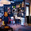 Surprising Work Space With Artistic Designs In Home Interior: Exciting Interior Design Workspace Adorn Incredible Home Decors Equipped With Black Swivel Chair And Red Chair With Dark Blue Walls And Black Wall Shelves With White Desk