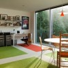 Surprising Work Space With Artistic Designs in Home Interior: Exceptional Interior Design Workspace Embellish Gorgeous House Decor Furnished With Green And Orange Rug With White Round Table And Wooden Chairs With Minimalist Pendant Lamp