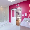 Enthralling Door Design To Greet And Welcome Your Guests With Impression: Simple White Sliding Door Made Of Translucent Glass Material And Woooden Element In White Tone Of Chic Bathroom In Bold Pink And Pristine White Tone With A Skylight In The Middle Of The Space