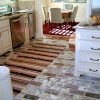 Alluring 10 Brick Floor Design For Unusual Interiors: Amazing Brick Kitchen Flooring With Striped Rug And Dazzling Marble Countertops As Well As Elegant Dining Room Decors