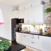 Having Fun Cooking In Bewitching Scandinavian Kitchen Designs: Awesome Small Kitchen Interior Design Equipped With Black Refrigerator And White Kitchen Cabinets Backsplash Ideas