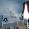 Charming Baby Room Decorating Ideas With Awesome Interior Design: Baby Girls Bedroom Blue Color With Brown Curtain Tieback And White Cot With Blue Walls With White Rocking Chair