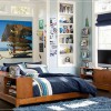 Idyllic Boys Room Designs with Modern Details: Boys Bedroom Designs With Blue Rug And TV Stand With Solid Wood Bed Frame And Storage Headboard Plus White Wall Shelves
