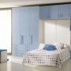 Idyllic Boys Room Designs with Modern Details: Boys Bedroom Ideas With Blue Theme Color Equipped With Cabinet Headboard And White Floor Lamp Near White Cube Stool Plus Polka Dot Bedding