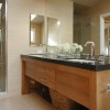 Undermount Sink Designs For Updated Bathroom: Contemporary Bathroom With A Chic Undermount Sink And A Large Mirror