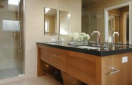 Undermount Sink Designs for Updated Bathroom : Contemporary Bathroom With A Chic Undermount Sink And A Large Mirror