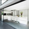 Charming White Details Dominate Impeccable Minimalist Home in Germany: Extraordinary All White Kitchen Design Equipped With Fascinating Modern Bar Stools In White Kitchen Island With Magnificent Microwave Oven Wall