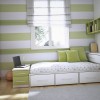 Impressive Boys Room Designs With Perky Decorations: Fascinating Green Bedroom Paint With Green Wall Shelves And Wonderful Bed Frame With Drawers As Well As Gray Square Rug And Wood Laminate Flooring