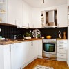 Having Fun Cooking In Bewitching Scandinavian Kitchen Designs: Ideas To Decorate Kitchen With Black Backsplash Tiles And Wooden Laminate Floors And Wooden Countertops With Oven And Stove