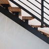 Magnetizing Contemporary Residence Design In Texas: Modern Wooden Stairs With Black Steels On White Wall