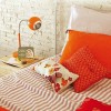 Marvelous Vivid Apartment Interiors in Barcelona: Orange And White Bedding With Wooden Bedside Table With Drawers In Awesome Bedroom Interior Apartment With Contemporary Unique Table Lamp Design