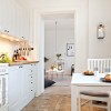 Having Fun Cooking In Bewitching Scandinavian Kitchen Designs: Rustic Flooring In The Small Kitchen Design With Kitchen Cabinets With White Chairs And White Table Design