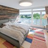 Captivating Elegant Nussberg Penthouse Displays Rustic Wooden Details: Rustic Wooden For Wall Decor In The Bedroom Combined With Modern Beds And White Door