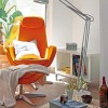 Marvelous Vivid Apartment Interiors in Barcelona: Swing Arm Floor Lamp Lies Near Orange Footstool And Orange Lounge Chair Adorn Apartment Interior In Living Room