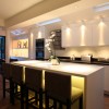 12 Fascinating Kitchen Trends with Fashionable Ideas for 2014: 2014 Interior Design Kitchen Ideas Adorned With Four Bar Stools Kitchen Island And Stunning White Kitchen Cabinets