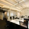 Idyllic Office Designs with Bright Interior Ideas: Black Swivel Chairs And Black Flooring Adorns Industrial Office Designs
