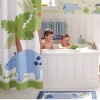 Attractive Home Design Tips for Inviting Interiors: Kids Bathroom Decor With Impressive Curtain And Lovely White Bathtub