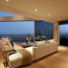 Overlooking Picturesque Landscape from Spectacular Home Design: Magnificent Living Room Design Ideas Showcase Remarkable Views And Round Coffee Table With Incredible L Shaped Sofa