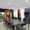 Designing Conference Room with Appealing Interior Ideas: Modern Conference Room Chairs And Prodigious Table With LED Monitor On The Wall And Remarkable Wall Decor