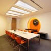 Designing Conference Room with Appealing Interior Ideas: Modern Conference Room Design With Orange Office Chairs And Stunning Ceiling Lights With White Office Table