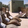 Attractive Home Design Tips for Inviting Interiors: Modern Home Patio Equipped With Wicker Lounge Chairs
