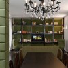 Brilliant Carola Vannini’s Ideas to Renovate Marco Polo Apartment in Rome: Modern Living Room Furniture Sets With Bookshelves And Two Green Egg Chairs As Well As Formal Dining Room Furniture Sets