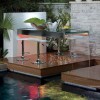 15 Appealing Outdoor Furniture for Chic Garden: Modern Outdoor Bar Stools Combined With Outdoor Swimming Pool Adorning Contemporary Home Design