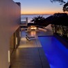 Breathtaking Contemporary Beach House with Perfect Architecture: Ocean Views From Swimming Pool Equipped With Awesome Fireplace Plus Two Lounge Chairs