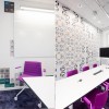 Designing Conference Room with Appealing Interior Ideas: Purple Office Chairs And Incredible Wall Stickers Adorning Conference Room Design