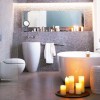 Awesome Decoration Ideas To Design Small Bathrooms: Small Modern Bathroom Completed With White Round Bathtub And End Table With Wall Mirror And Stunning Wall Decor