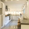 Stunning London Apartments With Elegant Interiors: Stupendous Kitchen Decorating Ideas For Apartments With 4 Bar Stools And Lovely White Kitchen Cabinets