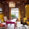 10 Eye-catching Home Office Designs with Creative Ideas: Yellow Theme For Decorating A Home Office Equipped With Pink Table And Yellow Office Desk As Well As Brick Walls And Yellow Window Curtains