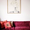 Rich Interior Design Ideas with Adorable Taste of Beautiful Chosen Colors: Endearing Pink Velvet Sofa With Mirrored Tea Tables In Captivating Drawing Room That Adorned With Artistic Brown Framed Sketch