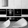 Marvelous Contemporary Home Portrays Simple Gallery: Amazing Black And White Kitchen Interior For Contemporary House Added With Four Modern White Bar Stools Plus Modern Kitchen Island