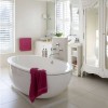 Enchanting Bathroom Design High Quality and Value to Your Home Décor: Captivating White Pristine Bathroom With Sleek Oval Bathtub And Stylish Stand Up Taps Made Of Steel And Vintage Cupboard With Ample Vertical Mirrors