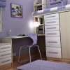 Lovely Interior Decorating Ideas of Girls’ Bedroom in Attractive Themes: Entrancing Girls Bedroom Interior Design In Purple Tone A Minimalist Home Office With A Corner Desk And Equipped With Vertical Open Shelf