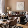 Awesome Modern Interior Ideas Rejuvenating Contemporary House: Incredible Brown Sofa And Two Cowhide Chairs For Living Room Decor Themes With Interesting Brown Wall And Lovely Rug Ideas