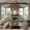 10 Astonishing Stone Fireplaces Brings Nature Materials at Home: Living Room High Ceiling With Stone Fireplace Design And Three Seat Sofa Also Impressive Ceiling Fan
